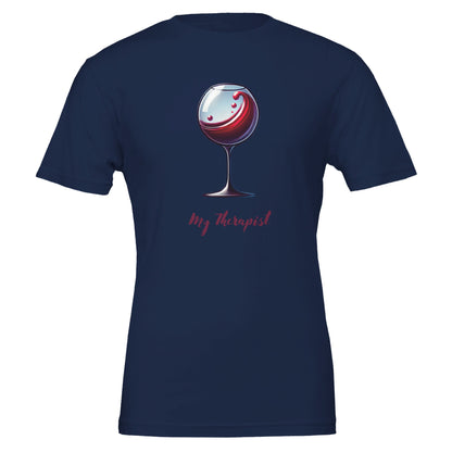 Navy T-shirt featuring a stylized illustration of a wine glass with swirling red wine and the phrase "My Therapist" in an elegant, playful font.