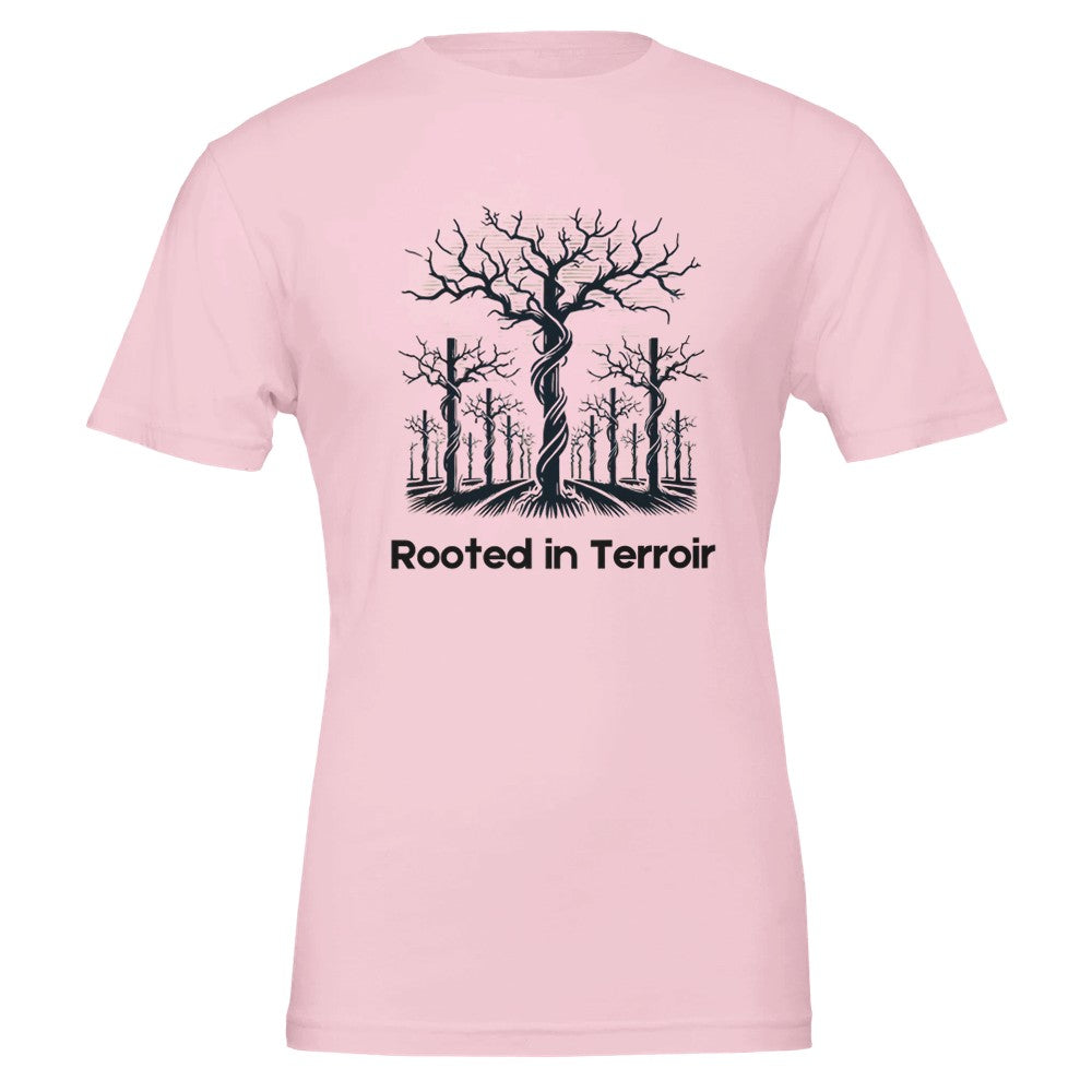 Pink T-shirt featuring a black silhouette of dormant grapevines with deep roots and the phrase "Rooted in Terroir", symbolizing the importance of soil and terroir in viticulture.