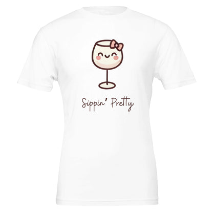 Cute white T-shirt featuring a cartoon-style wine glass with a bow and the phrase "Sippin' Pretty" in playful font.