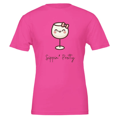 Cute hot pink T-shirt featuring a cartoon-style wine glass with a bow and the phrase "Sippin' Pretty" in playful font.