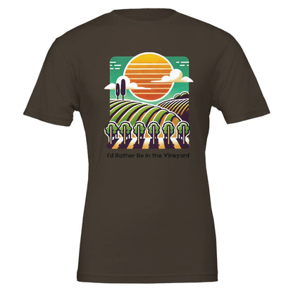 Brown T-shirt featuring a colorful illustration of a vineyard with rolling rows of grapevines under a sunset, along with the phrase "I'd Rather Be in the Vineyard", celebrating vineyard life.