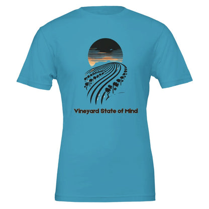 Teal T-shirt featuring a black silhouette of rolling vineyard rows under a sunset, with the phrase "Vineyard State of Mind", symbolizing a love for wine and vineyard life.