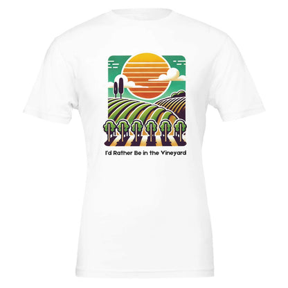 White T-shirt featuring a colorful illustration of a vineyard with rolling rows of grapevines under a sunset, along with the phrase "I'd Rather Be in the Vineyard", celebrating vineyard life.