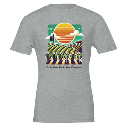 Gray T-shirt featuring a colorful illustration of a vineyard with rolling rows of grapevines under a sunset, along with the phrase "I'd Rather Be in the Vineyard", celebrating vineyard life.