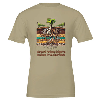 Tan T-shirt with a colorful illustration of grapevine roots extending through various soil layers, accompanied by the phrase "Great Wine Starts Below the Surface", emphasizing the importance of terroir in winemaking.