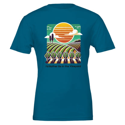 Teal T-shirt featuring a colorful illustration of a vineyard with rolling rows of grapevines under a sunset, along with the phrase "I'd Rather Be in the Vineyard", celebrating vineyard life.